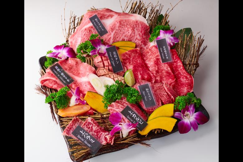 An A5 wagyu set laid out on the board